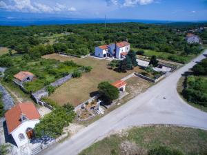 an aerial view of a house with a road at Apartments Dandić in Orlec