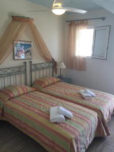 Postel nebo postele na pokoji v ubytování Vana Holidays