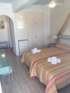 Postel nebo postele na pokoji v ubytování Vana Holidays