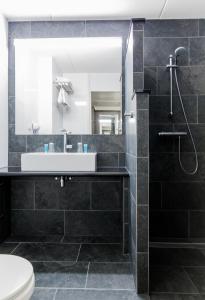 Koupelna v ubytování Bastion Hotel Bussum Hilversum + 26 fotografií