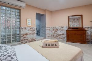 Posteľ alebo postele v izbe v ubytovaní Apartamento Maribel