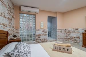 Posteľ alebo postele v izbe v ubytovaní Apartamento Maribel