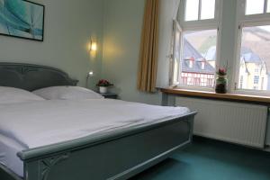 Katil atau katil-katil dalam bilik di Hotel Zum Stern