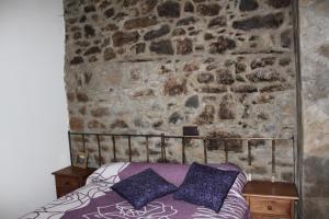 Posteľ alebo postele v izbe v ubytovaní Casa Rural Las Machorras I y II