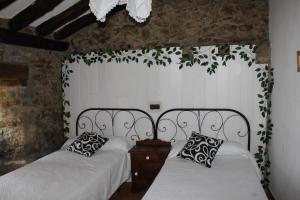 Posteľ alebo postele v izbe v ubytovaní Casa Rural Las Machorras I y II