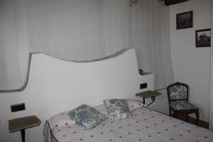 Posteľ alebo postele v izbe v ubytovaní Casa Rural Las Machorras I y II