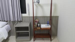 Rúm í herbergi á Yahweh Homestay