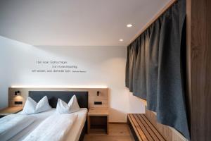 Posteľ alebo postele v izbe v ubytovaní Alpinhotel Vajolet - Adults only