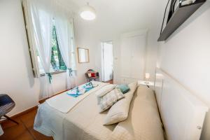 En eller flere senge i et værelse på Villa Cosimo + 37 billeder