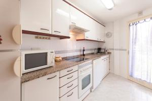 Nhà bếp/bếp nhỏ tại Lets Holidays apartment terrace La Guardia