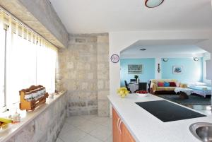 Ein Bett oder Betten in einem Zimmer der Unterkunft Stone Villa Rea