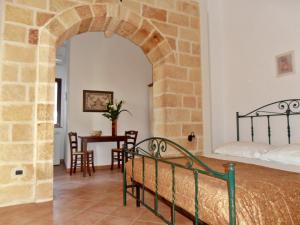 Postel nebo postele na pokoji v ubytování Il Corallo del Salento + 34 fotografií