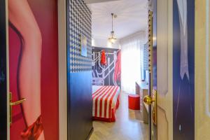 Postel nebo postele na pokoji v ubytování Admiral Art Hotel