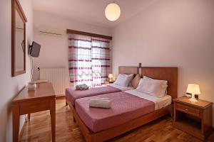Postel nebo postele na pokoji v ubytování Sol & Mare - Beach Front + 28 fotografií