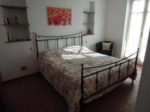 Postel nebo postele na pokoji v ubytování Cad'Teresot + 20 fotografií