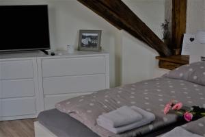 Postel nebo postele na pokoji v ubytování Penzion a relax centrum Andělka