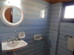Ванна кімната в Gigilos