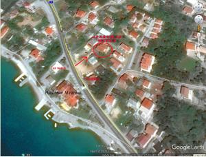 an overhead view of a map of a house at Apartments&Rooms Milka in Starigrad-Paklenica