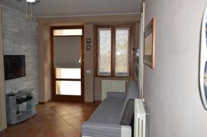 TV a/nebo společenská místnost v ubytování Il Melograno b&b Apartament