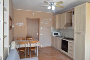 Kuchyň nebo kuchyňský kout v ubytování Il Melograno b&b Apartament