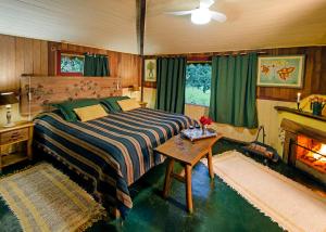 Ένα ή περισσότερα κρεβάτια σε δωμάτιο στο Pousada Fazenda do Mel
