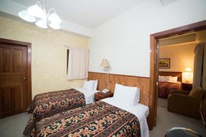 Cama o camas de una habitación en Hotel Anna Inn