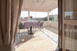 Balkón nebo terasa v ubytování Rooms and apartments PALMA B&B + 37 fotografií