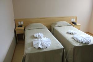 Ένα ή περισσότερα κρεβάτια σε δωμάτιο στο Hotel Galícia