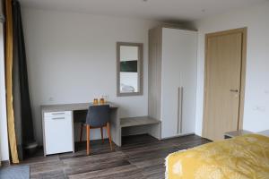 Rúm í herbergi á Hotel 1001 Nott