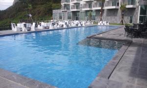 Bazén v ubytování Y Resort Jeju nebo v jeho okolí