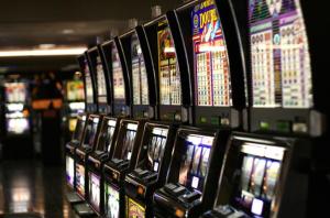 a row of video poker machines in a casino at PADDY'S HOTEL & APARTMENTS in Port Moresby