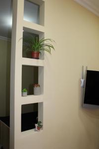 TV a/nebo společenská místnost v ubytování Easy Guest House