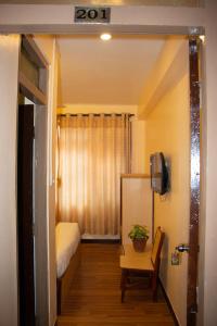 Una cama o camas en una habitación de Hotel Lapha