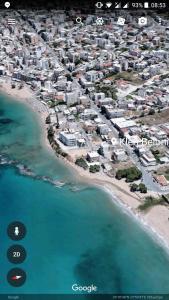 an aerial view of a resort on the beach at Kleri Beloni Rooms in Chania