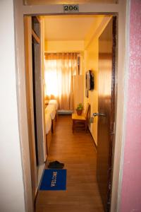 Una cama o camas en una habitación de Hotel Lapha