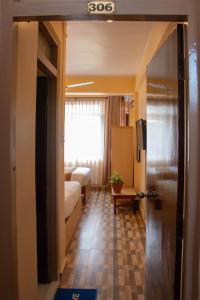 Una cama o camas en una habitación de Hotel Lapha