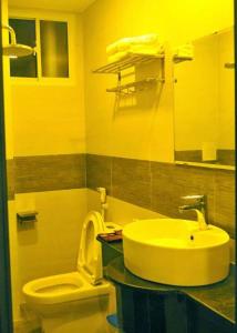 Koupelna v ubytování Aries Hotel