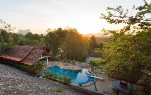 an overhead view of a swimming pool at a resort at Krabi Villa Phu Khao Private Resort in Klong Muang Beach