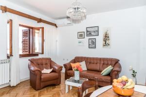 Posezení v ubytování Apartment Promona Drniš