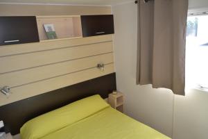 Llit o llits en una habitació de Camping Pirinenc