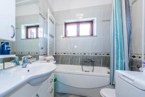 Koupelna v ubytování Apartment Promona Drniš + 37 fotografií