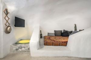 Llit o llits en una habitació de Traditional Farmers Caves