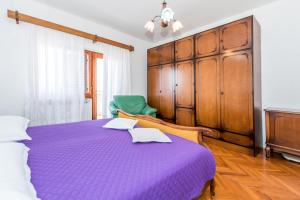 Postel nebo postele na pokoji v ubytování Apartment Promona Drniš