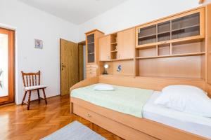 Postel nebo postele na pokoji v ubytování Apartment Promona Drniš
