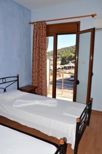 Katil atau katil-katil dalam bilik di Karatzas
