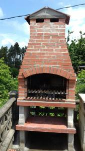 a brick oven sitting on top of a bridge at La Coruxa in Los Cabos