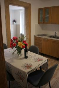 A kitchen or kitchenette at Apartmánový dom Mária