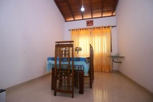 Ένα ή περισσότερα κρεβάτια σε δωμάτιο στο Sajee Villa