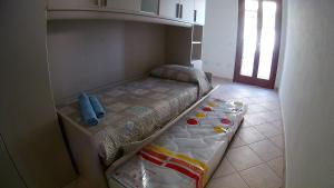 Postel nebo postele na pokoji v ubytování Alex Apartment Pula
