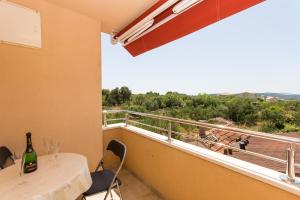 Ein Balkon oder eine Terrasse in der Unterkunft Apartments Vukman